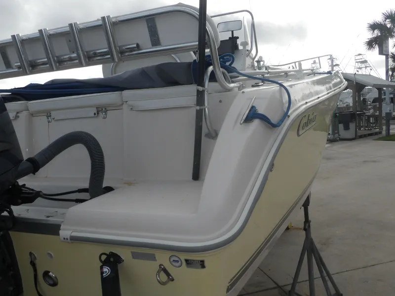 Slide: The Image of 2006 Cobia 214 Center Console boat at dock. - 7