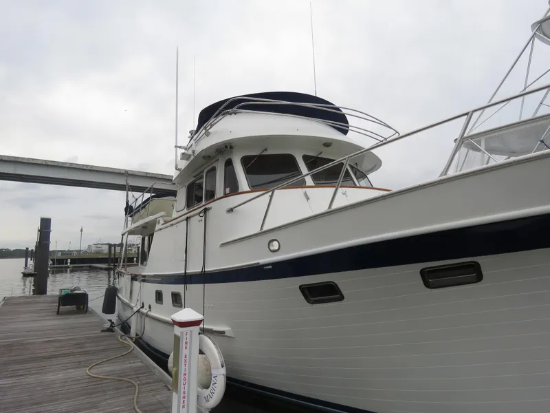 Slide: The Image of 1987 DeFever 49 Pilothouse moored at dock. - 3