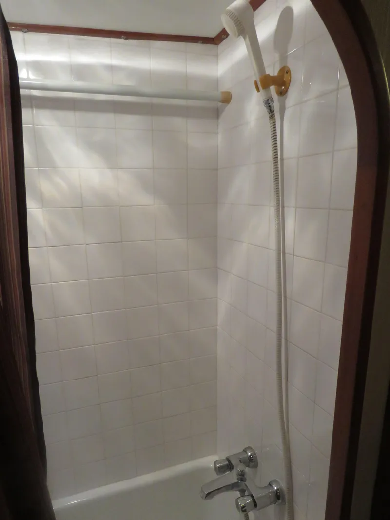Slide: The Image of Shower in a 1987 DeFever 49 Pilothouse yacht. - 39