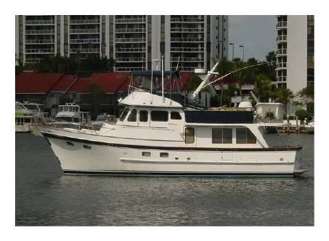 Slide: The Image of 1987 DeFever 49 Pilothouse yacht docked in harbor. - 4