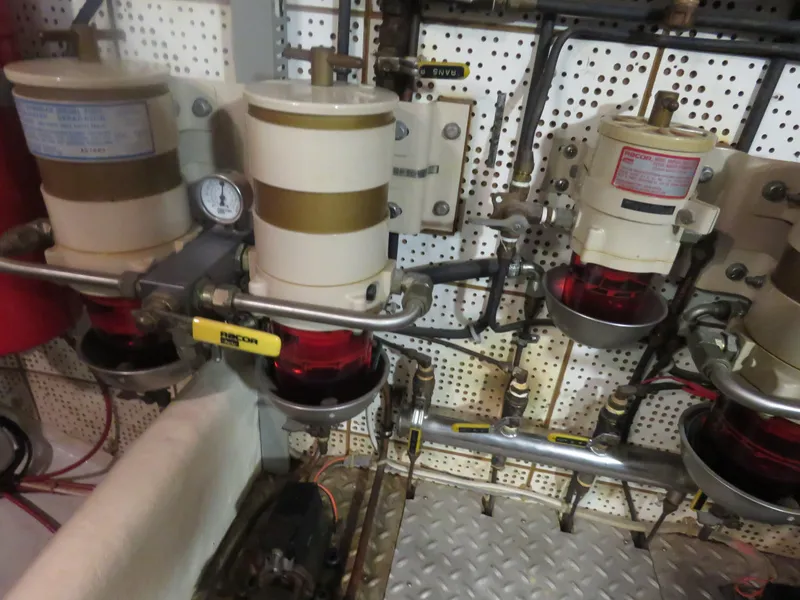 Slide: The Image of 1987 DeFever 49 Pilothouse engine room with fuel filters. - 47