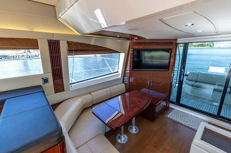 Slide: The Image of Luxurious interior of 2016 Sea Ray 510 Fly yacht with elegant seating and waterfront view. - 11