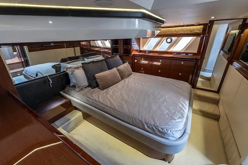 Slide: The Image of Luxurious bedroom interior of 2016 Sea Ray 510 Fly yacht with elegant furnishings. - 19