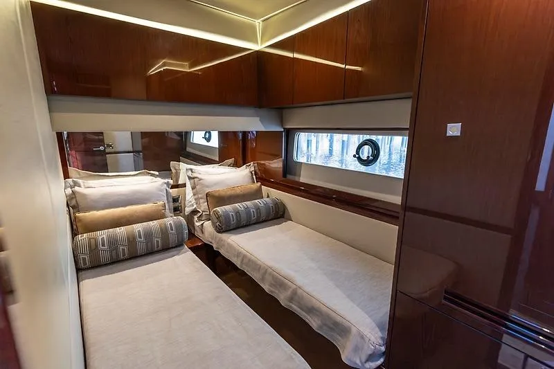 Slide: The Image of Luxurious cabin interior of 2016 Sea Ray 510 Fly yacht with twin beds. - 20