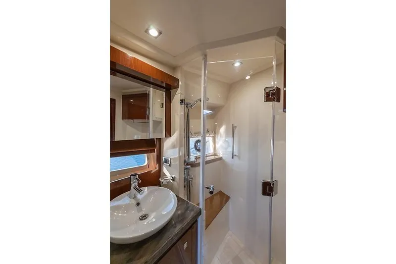 Slide: The Image of Luxurious bathroom of the 2016 Sea Ray 510 Fly yacht. - 21