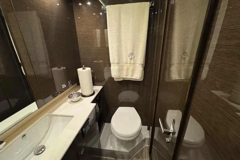 Slide: The Image of Luxurious bathroom in 2019 Cruisers Yachts 50 Cantius with modern fixtures and elegant design. - 25