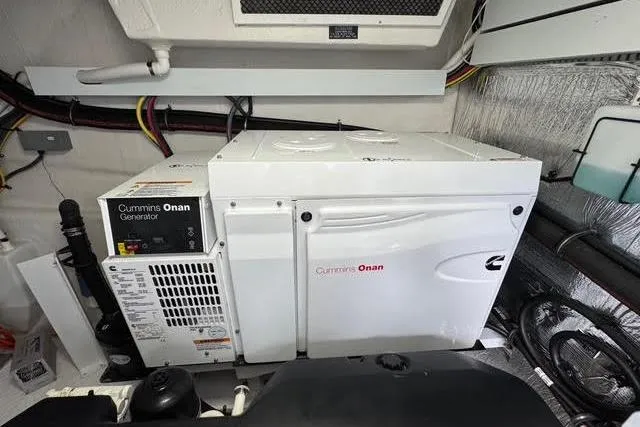 Slide: The Image of Cummins Onan generator in 2019 Cruisers Yachts 50 Cantius engine room. - 37