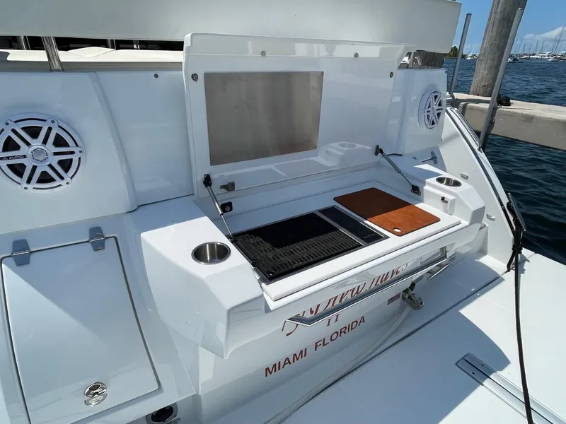 Slide: The Image of 2019 Cruisers 50 Cantius yacht with outdoor grill in Miami, Florida. - 7