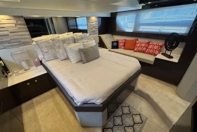 Slide: The Image of Luxurious bedroom interior of 2019 Cruisers Yachts 50 Cantius with modern decor and cozy seating. - 21
