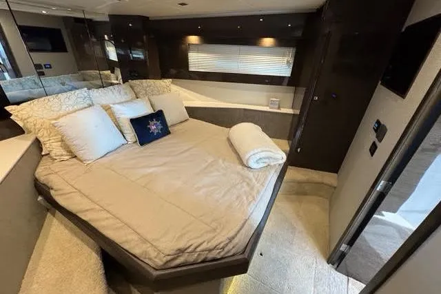 Slide: The Image of Luxurious bedroom interior of 2019 Cruisers Yachts 50 Cantius with elegant bedding and modern design. - 26