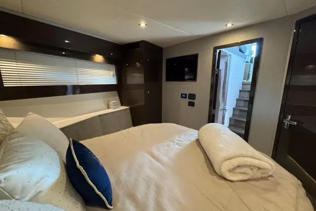 Slide: The Image of Luxurious bedroom interior of 2019 Cruisers Yachts 50 Cantius with modern design and cozy bedding. - 27