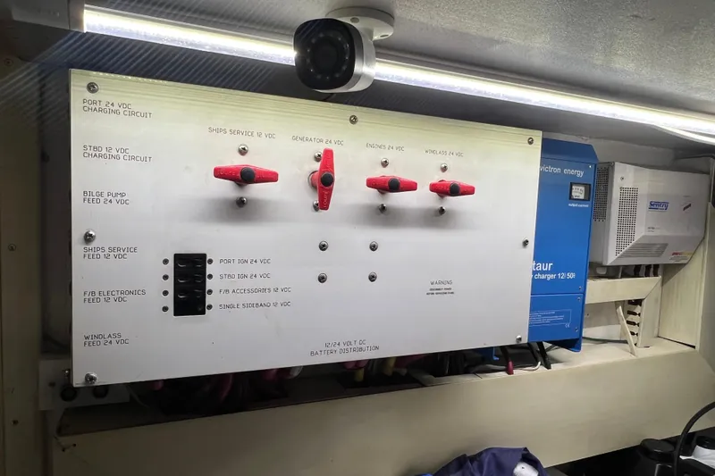 Slide: The Image of Electrical panel of a 1999 Viking 60 CPMY yacht with battery distribution. - 127
