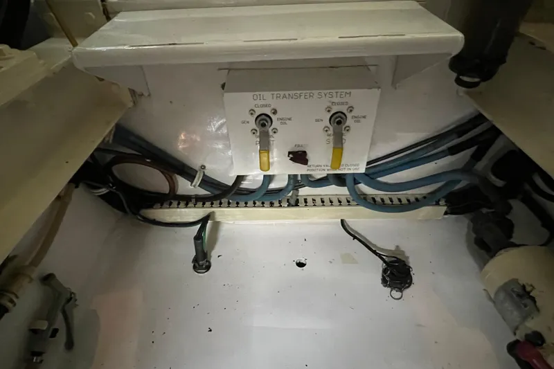 Slide: The Image of Oil transfer system controls on a 1999 Viking 60 CPMY yacht engine room. - 129