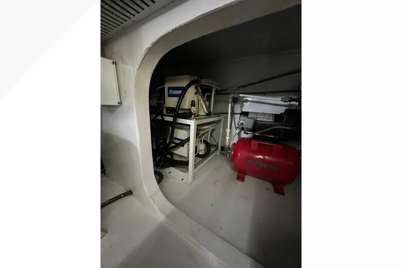 Slide: The Image of Engine room of 1999 Viking 60 CPMY yacht with machinery and equipment. - 144