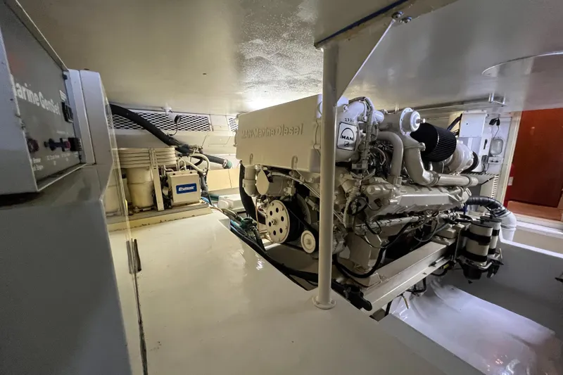 Slide: The Image of Engine room of 1999 Viking 60 CPMY yacht with MAN diesel engine. - 145
