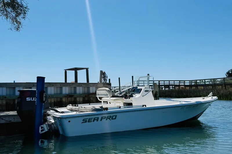 Slide: The Image of 2017 Sea Pro 208 Bay boat docked on a sunny day. - 11