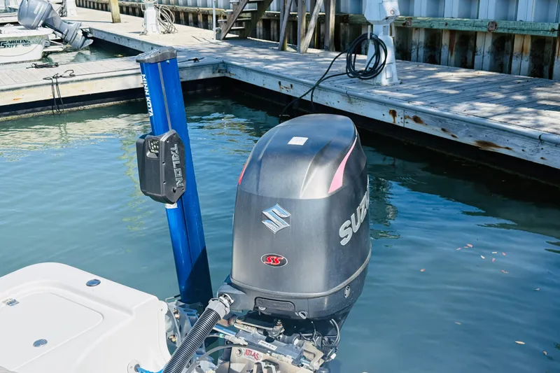 Slide: The Image of 2017 Sea Pro 208 Bay boat with Suzuki outboard motor docked at marina. - 15