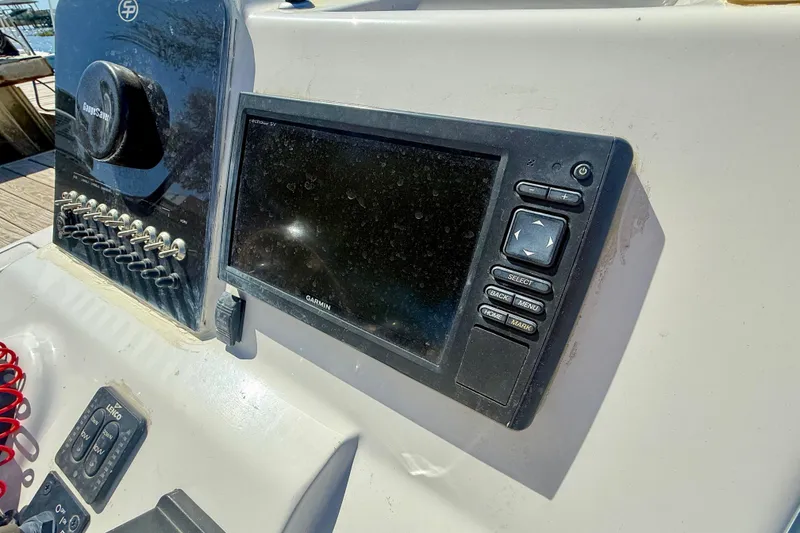 Slide: The Image of Control panel of a 2017 Sea Pro 208 Bay boat with Garmin display. - 20