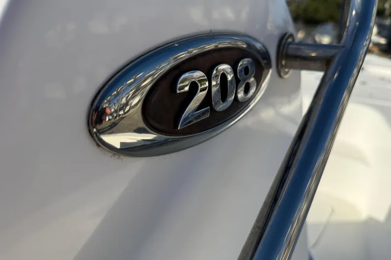 Slide: The Image of Close-up of 2017 Sea Pro 208 Bay boat emblem and railing. - 7