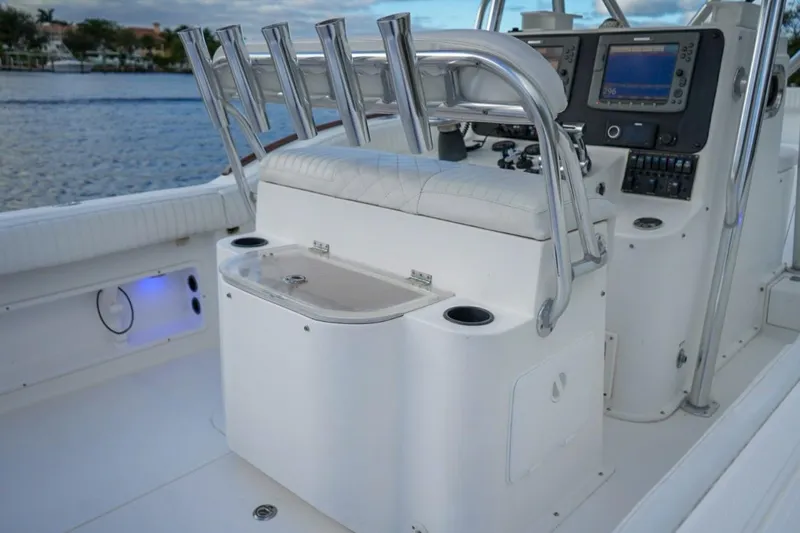 Slide: The Image of 2008 Buddy Davis 28 Center Console boat interior with helm and seating. - 8