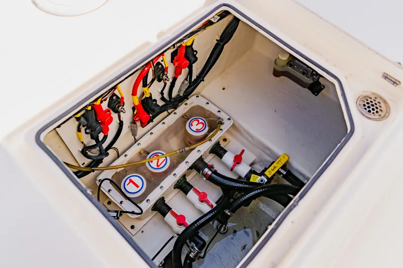 Slide: The Image of 2017 Cobia 344 Center Console boat wiring and plumbing compartment. - 48