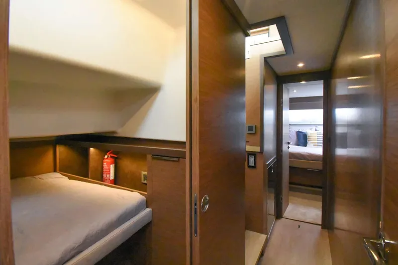 Slide: The Image of Interior of 2021 Lagoon 50 yacht with cozy cabin and hallway view. - 11