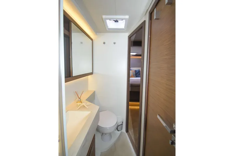 Slide: The Image of Modern bathroom interior on 2021 Lagoon 50 yacht, featuring sleek design and natural lighting. - 21