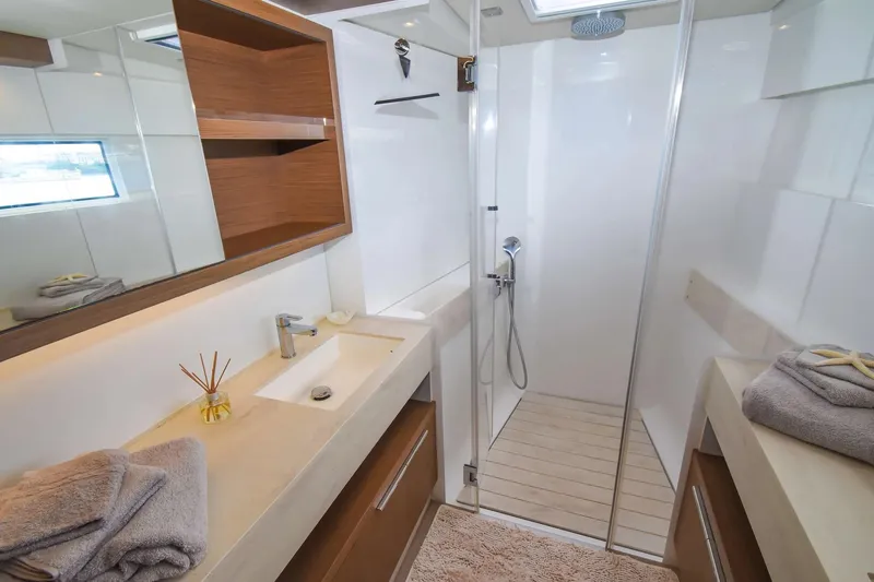Slide: The Image of Luxurious bathroom in 2021 Lagoon 50 yacht with modern fixtures and spacious shower. - 29