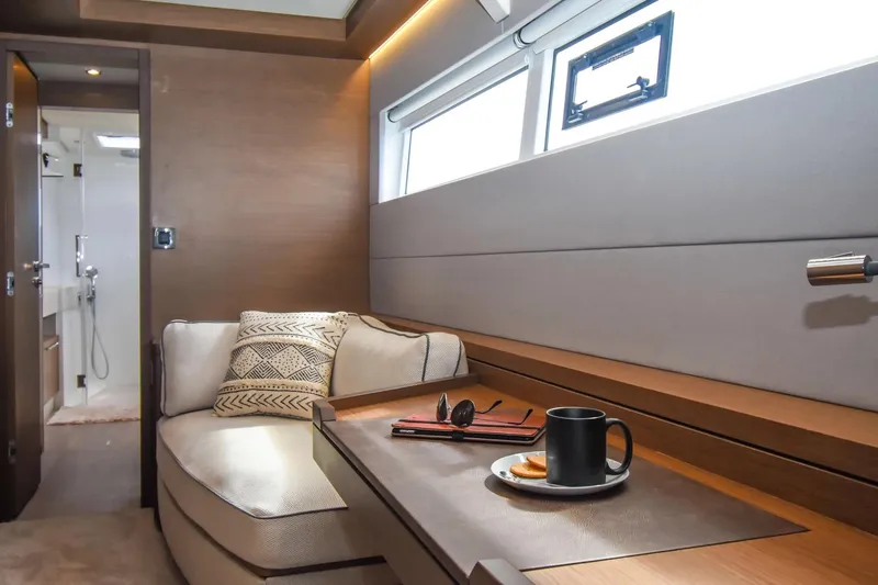 Slide: The Image of Luxurious interior of 2021 Lagoon 50 yacht with cozy seating and modern decor. - 30