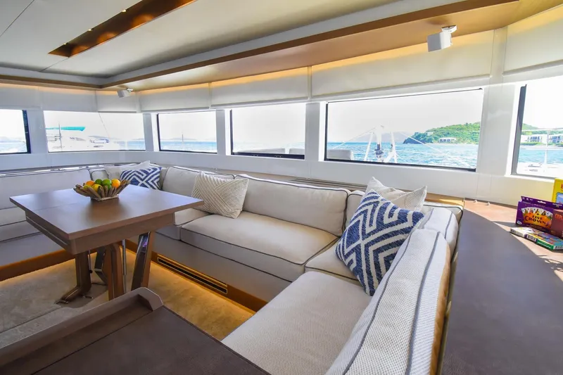 Slide: The Image of Luxurious interior of 2021 Lagoon 50 yacht with elegant seating and ocean view. - 31