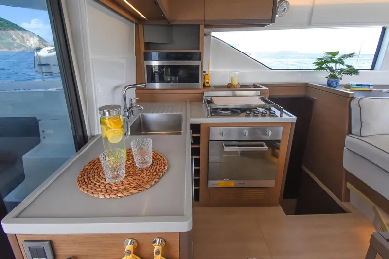 Slide: The Image of Modern kitchen interior on 2021 Lagoon 50 yacht with ocean view. - 36