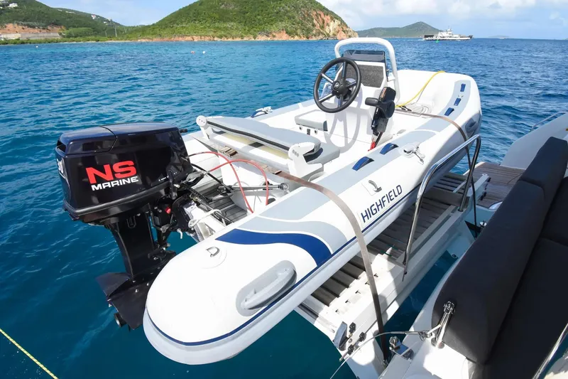 Slide: The Image of Highfield inflatable boat with NS Marine engine on Lagoon 50, 2021 model, in scenic waters. - 44