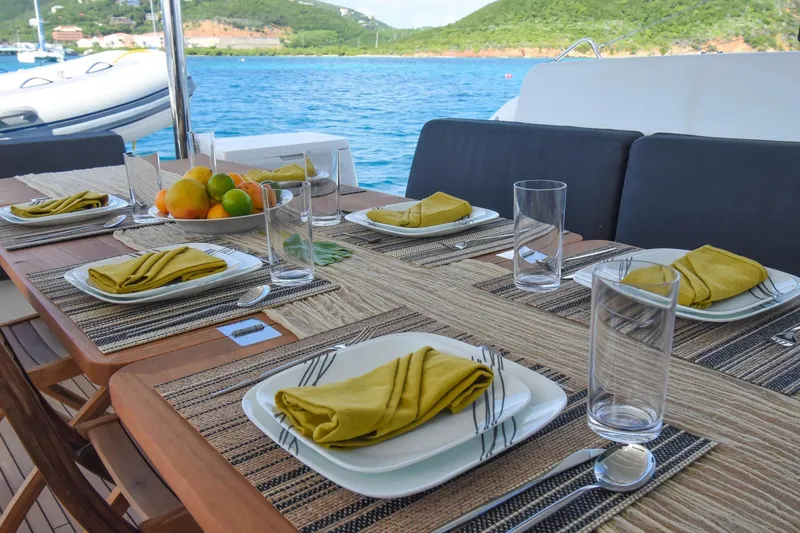 Slide: The Image of Elegant dining setup on Lagoon 50 yacht, 2021 model, with ocean view. - 47