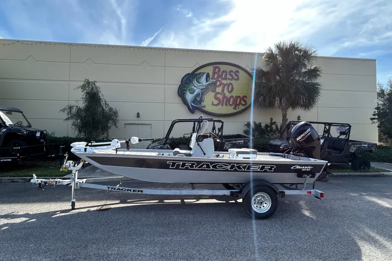 Slide: The Image of 2026 Tracker Bass Tracker Classic CC boat outside Bass Pro Shops. - 2