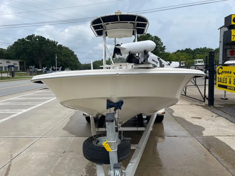 Slide: The Image of 2014 Carolina Skiff 218 DLV on a trailer, front view. - 16