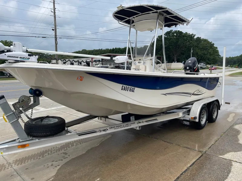 Slide: The Image of 2014 Carolina Skiff 218 DLV on trailer, side view. - 17