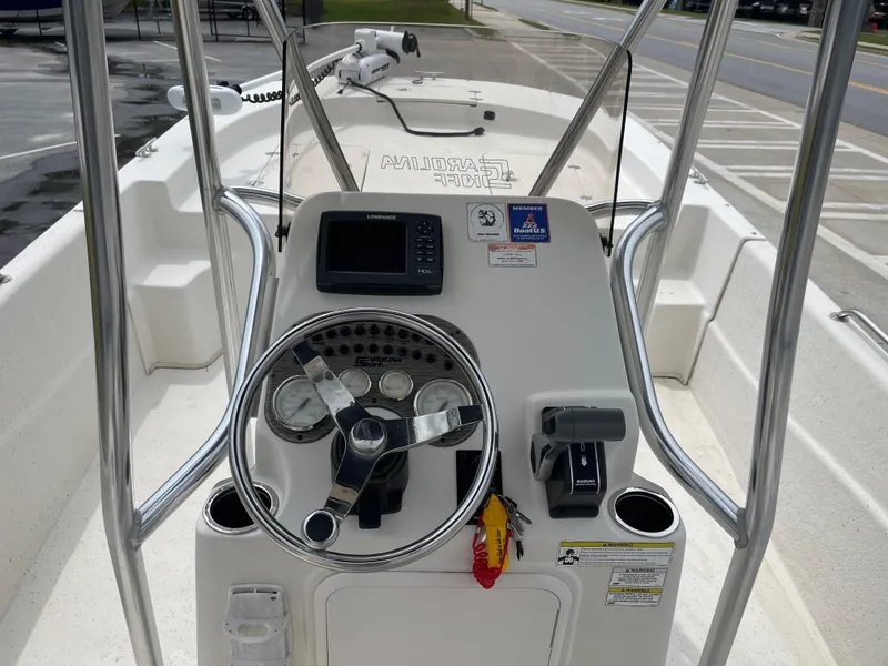 Slide: The Image of Console of a 2014 Carolina Skiff 218 DLV boat. - 33