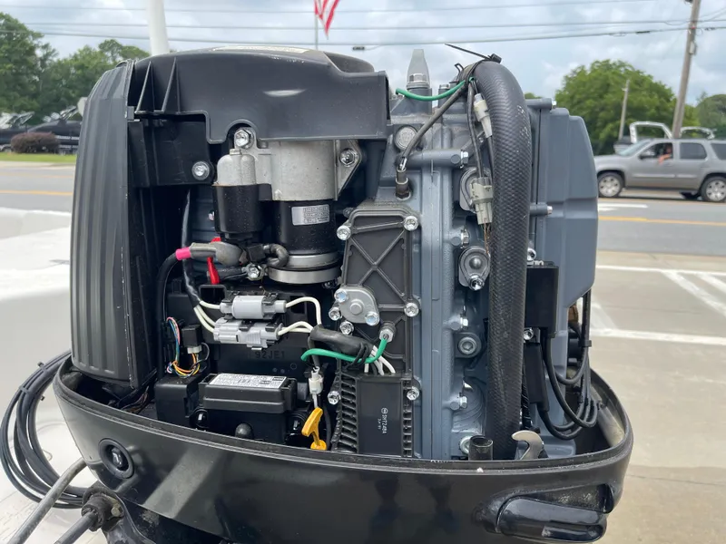 Slide: The Image of Outboard motor of a 2014 Carolina Skiff 218 DLV boat. - 41