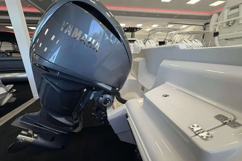 Slide: The Image of 2026 Key West 239 FS boat with Yamaha outboard motor in showroom. - 21