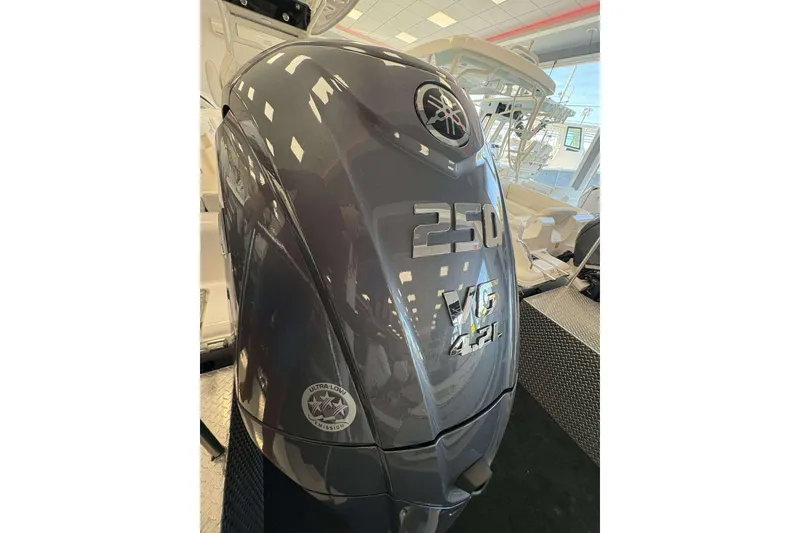 Slide: The Image of 2026 Key West 239 FS boat with Yamaha 250 outboard engine in showroom. - 22