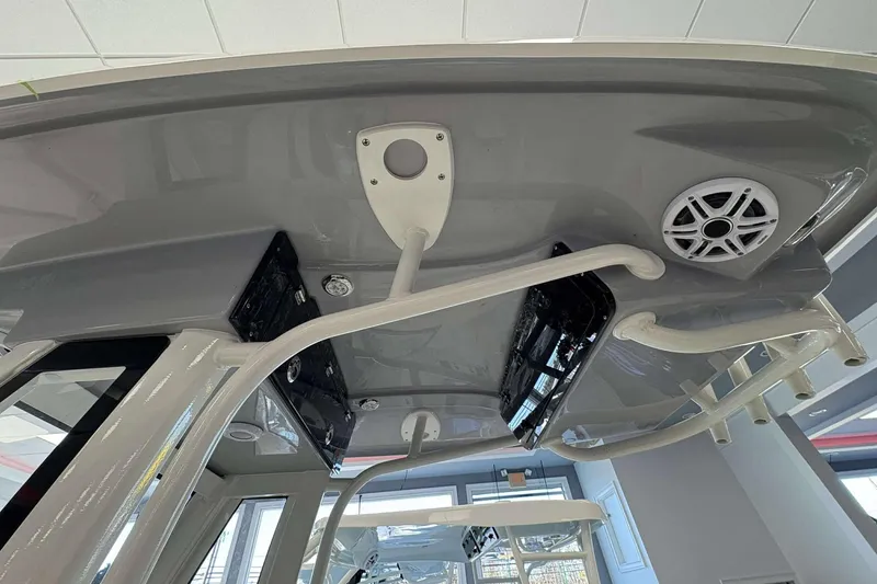 Slide: The Image of 2026 Key West 239 FS boat interior with modern design and speaker system. - 4