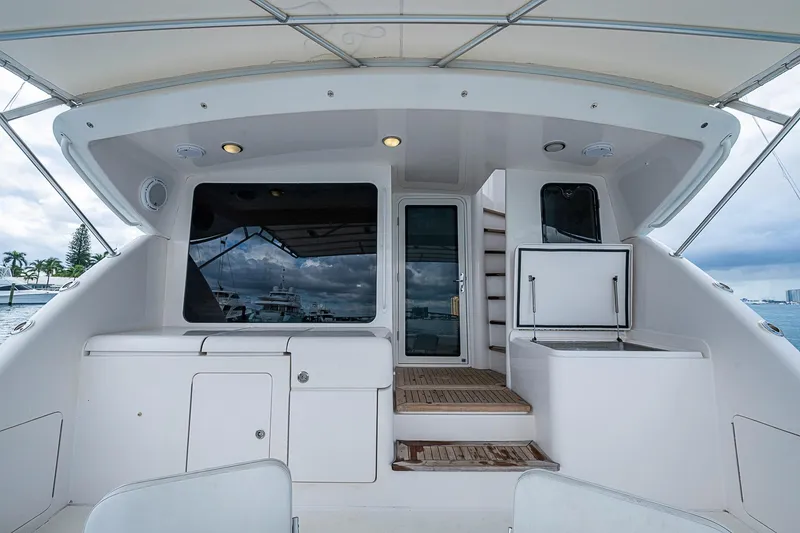 Slide: The Image of 2006 Bertram 630 Convertible yacht interior with sleek design and modern amenities. - 16