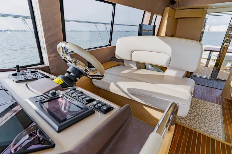 Slide: The Image of Luxurious interior of 2015 Monte Carlo MC5 yacht with modern helm and seating. - 22