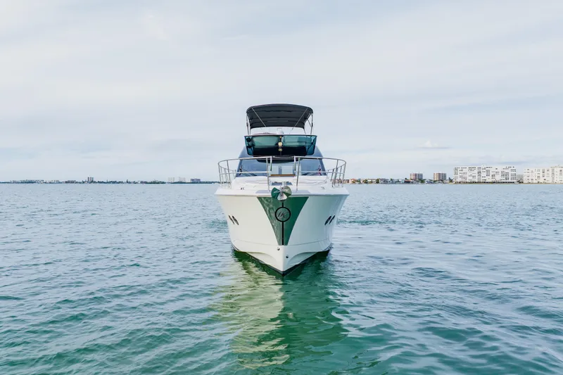 Slide: The Image of Monte Carlo MC5 2015 yacht on calm water with cityscape background. - 3