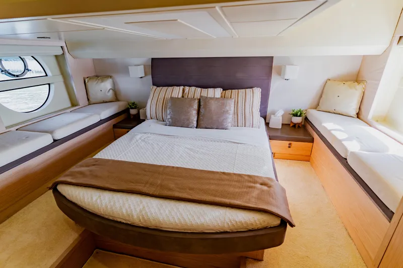Slide: The Image of Luxurious bedroom interior of 2015 Monte Carlo MC5 yacht with elegant bedding and seating. - 30