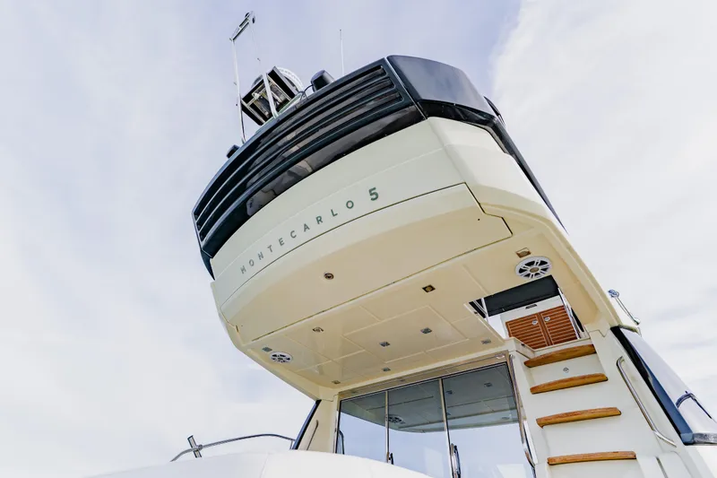 Slide: The Image of Luxury Monte Carlo MC5 yacht, 2015 model, showcasing sleek design and modern features. - 83