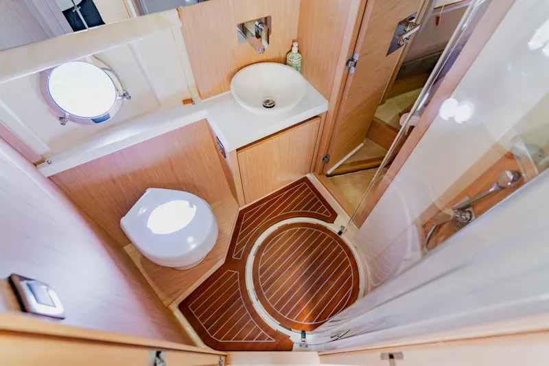 Slide: The Image of Luxurious 2015 Monte Carlo MC5 yacht bathroom with modern fixtures and wooden flooring. - 42