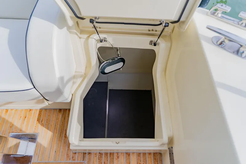 Slide: The Image of Open storage compartment on 2015 Monte Carlo MC5 boat deck. - 69