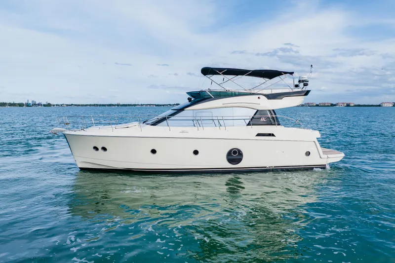 Slide: The Image of Luxury 2015 Monte Carlo MC5 yacht cruising on serene blue waters. - 7