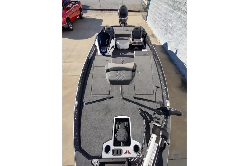 Slide: The Image of 2026 Vexus VXs21 fishing boat with spacious deck and modern seating. - 10